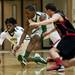 Huron High School senior Demetrius Sims dives for a loose ball in the game against Pickney on Monday, March 4. Daniel Brenner I AnnArbor.com
